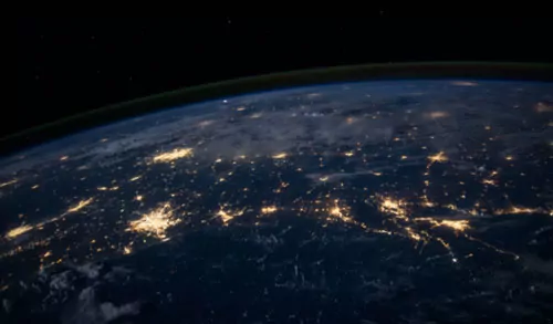 Night time view from space with city lights